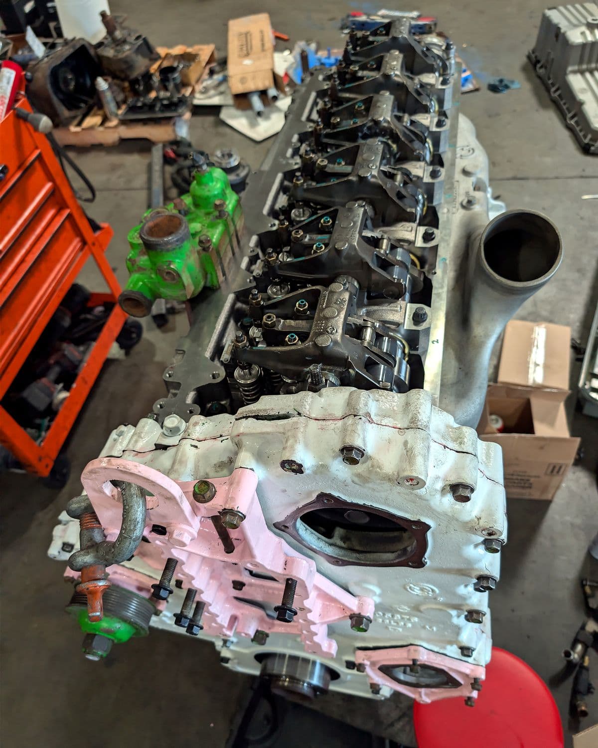 Top of a heavy-duty diesel engine with the valvetrain exposed during a custom engine build
